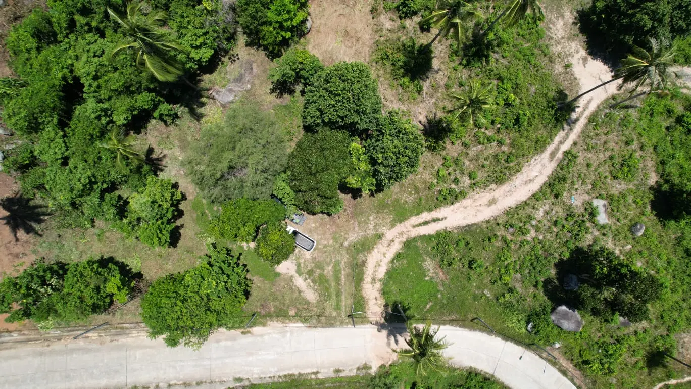 Prime Land Parcel with Partial Sea View for Sale in Chaweng Noi, Koh Samui – Red Title Deed (Chanote), Public Road Access & Electricity Ready